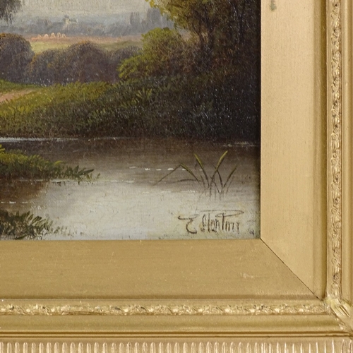 1243 - E Horton, oil on canvas, traveller on a riverside path, signed, 10