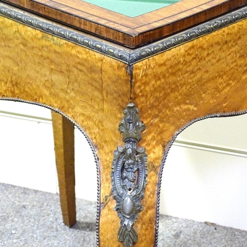 328 - A 19th century maple and kingwood vitrine table, with ormolu mouldings and mounts, and cabriole legs... 