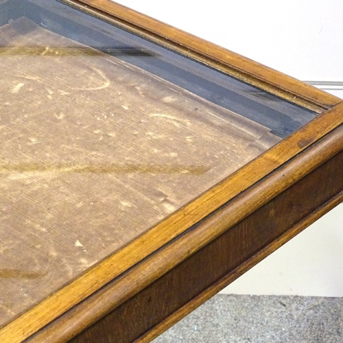 341 - A 19th century rosewood vitrine table with bevel-glass panelled top, carved centre column and shaped... 