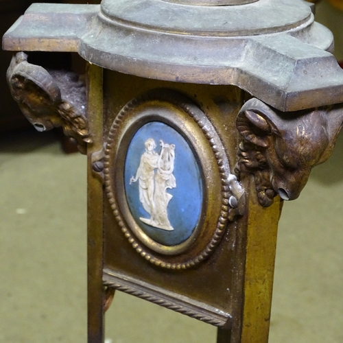 342 - A 19th century gilt-bronze standard lamp, with inset Wedgwood plaques and ram's head mounts