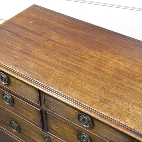 349A - An unusual early 19th century mahogany chest of drawers of small size, with 4 short and 2 long drawe... 