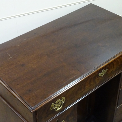 349C - A George III mahogany knee-hole desk with alcove cupboard, width 3'1