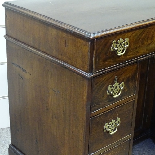 349C - A George III mahogany knee-hole desk with alcove cupboard, width 3'1