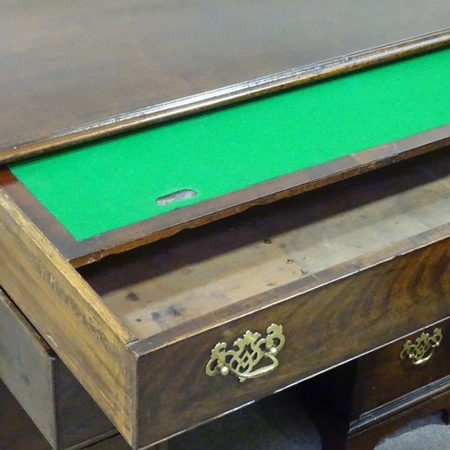 349C - A George III mahogany knee-hole desk with alcove cupboard, width 3'1