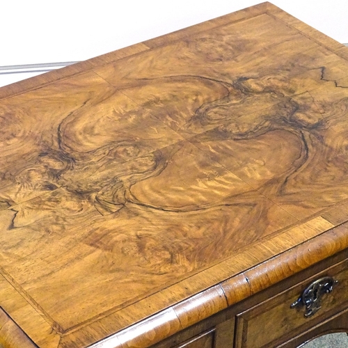 349F - A walnut lowboy with 3 frieze drawers and carved cabriole legs, width 2'5