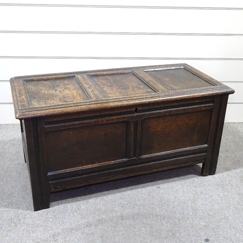 349G - An early 18th century panelled oak coffer, length 4'2