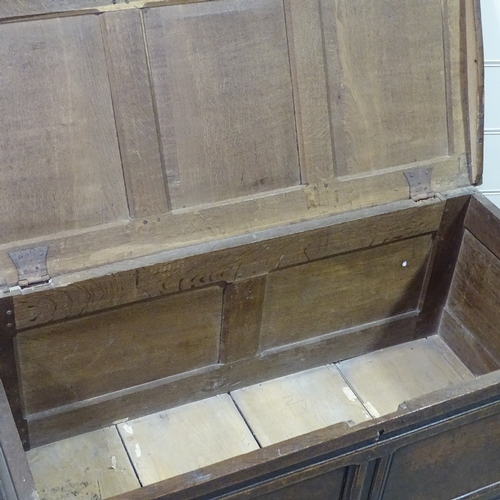 349G - An early 18th century panelled oak coffer, length 4'2