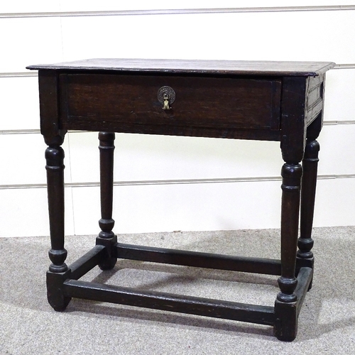 349I - A George III joined oak side table, with turned supports, frieze drawer and square stretchers, 28.5