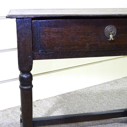 349I - A George III joined oak side table, with turned supports, frieze drawer and square stretchers, 28.5