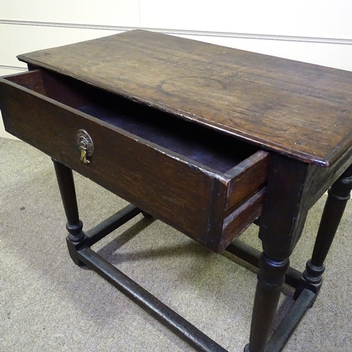 349I - A George III joined oak side table, with turned supports, frieze drawer and square stretchers, 28.5