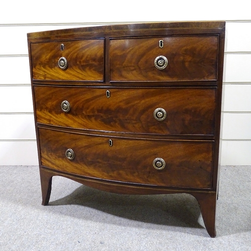 349J - A George IV crossbanded mahogany bow-front chest of drawers, width 34.5