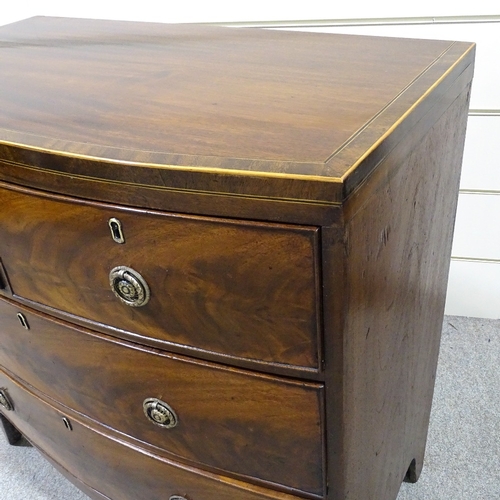 349J - A George IV crossbanded mahogany bow-front chest of drawers, width 34.5