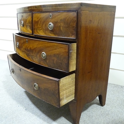 349J - A George IV crossbanded mahogany bow-front chest of drawers, width 34.5