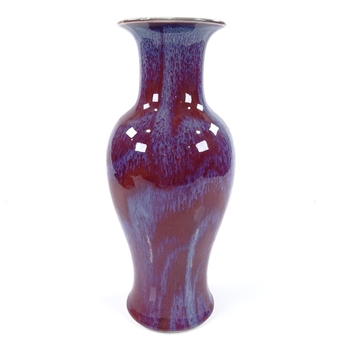 125 - A Chinese red flambe glaze vase, height 30cm