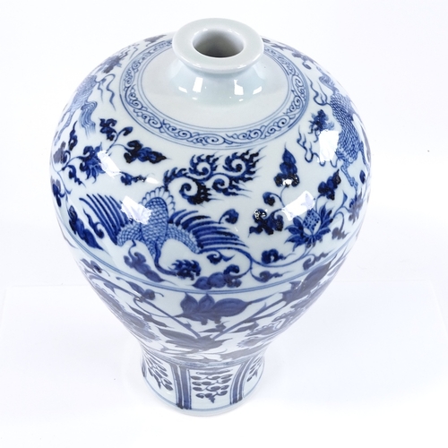 130 - A Chinese blue and white porcelain vase, with painted mythological beasts, height 34cm