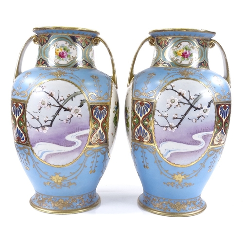 134 - A pair of Japanese blue and gold ground porcelain 2-handled vases, with hand painted bird decorated ... 