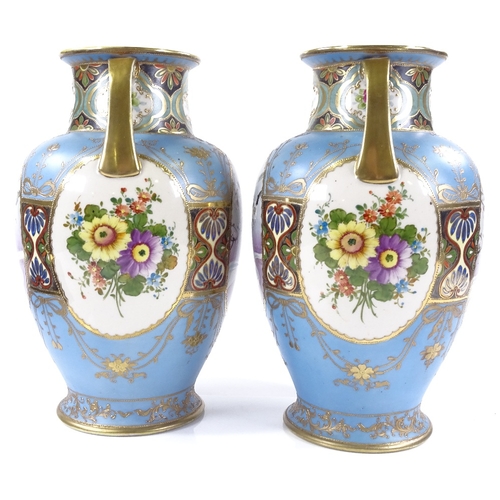 134 - A pair of Japanese blue and gold ground porcelain 2-handled vases, with hand painted bird decorated ... 