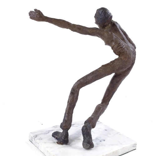 139 - A modernist patinated bronze figure of a man on marble base, height 34cm