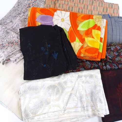 145 - A group of modern Japanese kimono, unused and in original wrapping