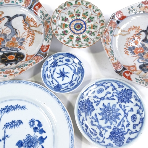 157 - A group of Chinese and Japanese porcelain plates and bowls, including a pair of Japanese Arita octag... 