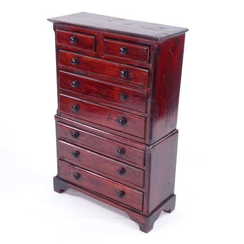 165 - An early 20th century stained wood table-top chest on chest, height 45cm, width 29cm