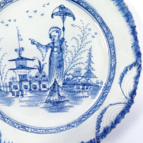 166 - A 19th century Pearlware plate, decorated with an Oriental figure in landscape, no factory marks, di... 