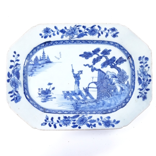 167 - A Chinese 18th century blue and white porcelain meat plate, decorated with a figure on a raft, 31cm ... 