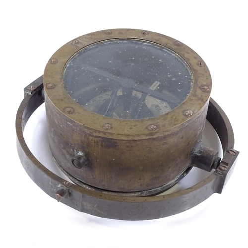 188 - A brass-cased ship's compass in gimballed mount, serial no. 2958E