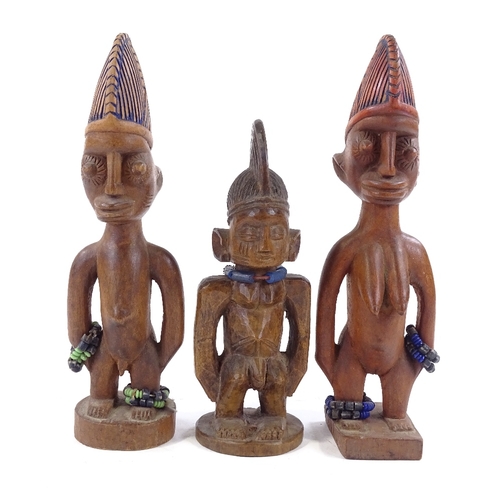 193 - 3 African Yoruba Ibejis, carved wood with bead mounts, height 30cm