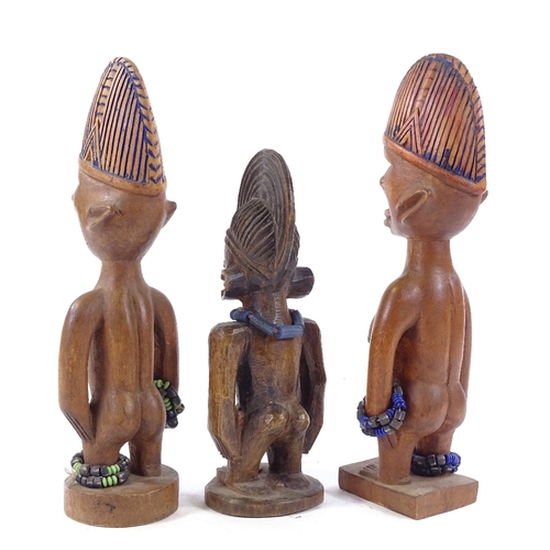 193 - 3 African Yoruba Ibejis, carved wood with bead mounts, height 30cm