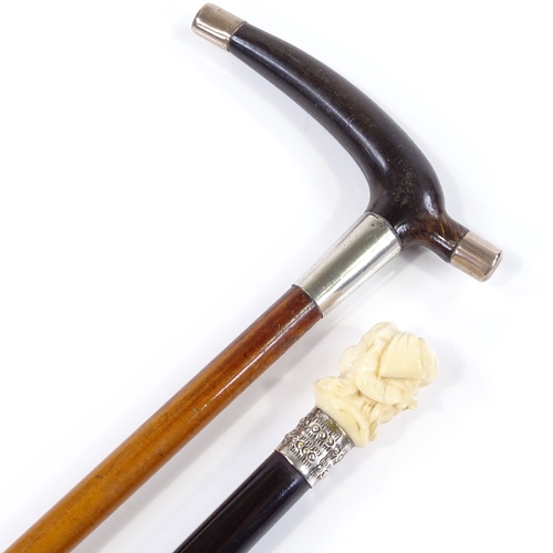 101 - An ebony walking cane with carved ivory handle in the form of a child's head, together with another ... 