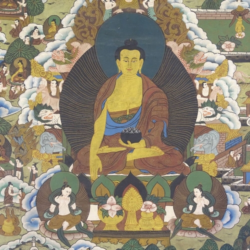 108 - An Oriental watercolour thangka on linen, depicting a seated Buddha, in green silk surround with fin... 