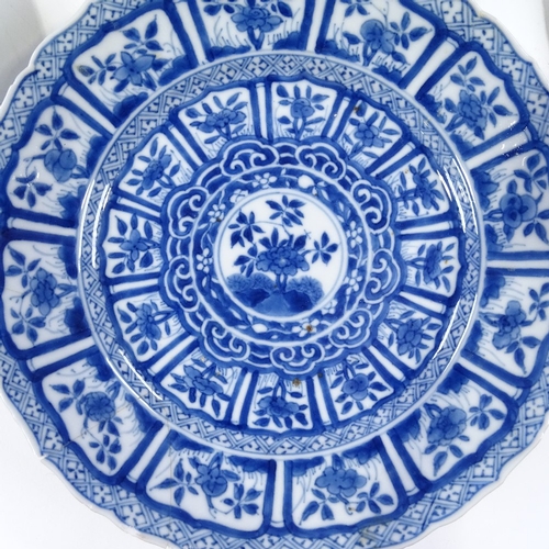 112 - A group of Chinese porcelain bowls and plates, most chipped or repaired