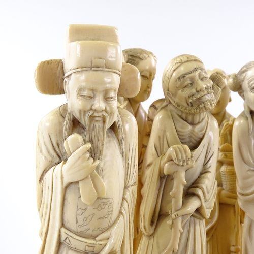 3 - A set of 8 Japanese ivory okimono, standing figures, Meiji Period, circa 1900, height 18cm