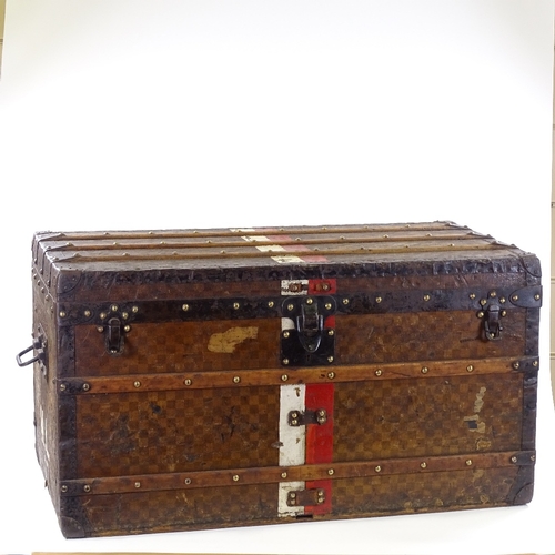 43 - A Louis Vuitton wood and metal-bound Vintage travelling trunk, original chequer design ground with o... 