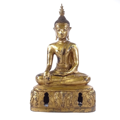 47 - An Oriental gilt-bronze heavy gauge seated Buddha, height 56cm