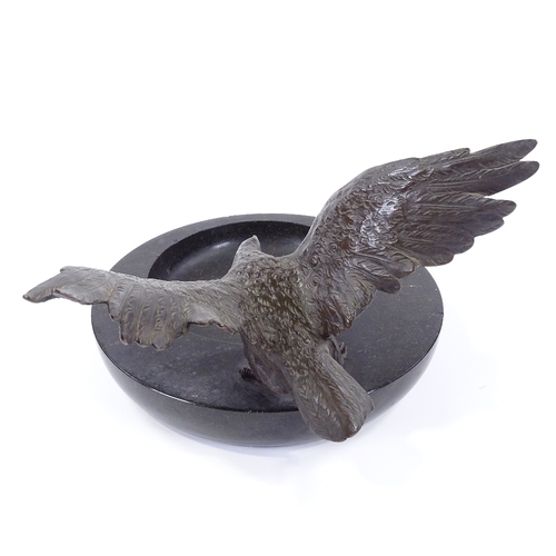 5 - A 19th century polished marble bowl, surmounted by a bronze eagle with spread wings, unsigned, bowl ... 