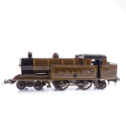 63 - A Bassett Lowke one gauge tank locomotive 4.4.2. 1920s' / 30s', painted in London Brighton & South E... 