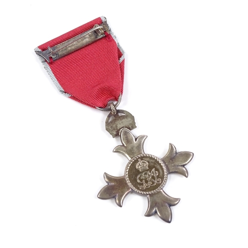 65 - A cased MBE medal with leaflet, unknown recipient