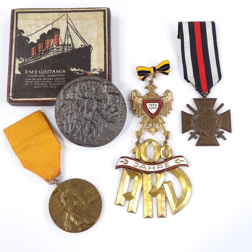 68 - 4 various German related medals, including a Lusitania commemorative coin