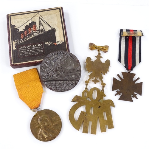 68 - 4 various German related medals, including a Lusitania commemorative coin