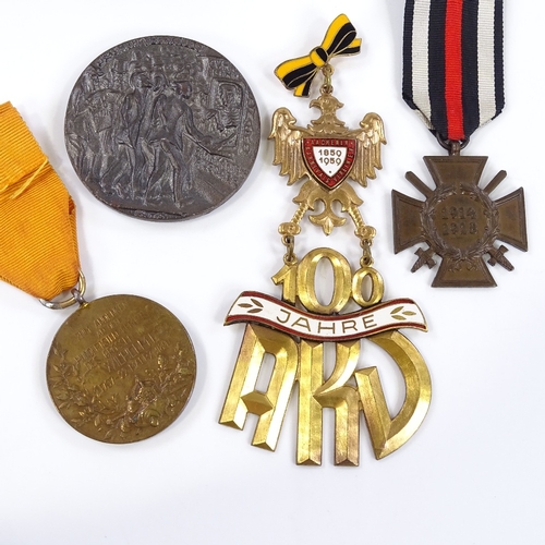 68 - 4 various German related medals, including a Lusitania commemorative coin