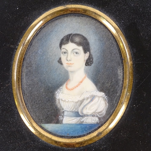 75 - A 19th century miniature watercolour on ivory, portrait of a girl in original ebonised frame, overal... 