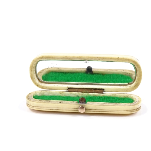 76 - A miniature Georgian ivory toothpick case, with gold pique inlaid lid, length 6cm