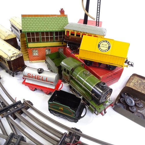 81 - A quantity of Hornby O gauge model railway, including electric loco and tender, a quantity of 3 rail... 