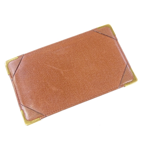 97 - A Louis Vuitton monogram card holder/wallet, serial no. 873/RA, 15cm x 9cm