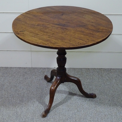 329 - An early 19th century circular mahogany tilt-top tea table on tripod base, 29.5