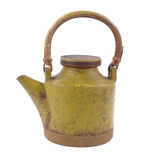 228 - Robin Welch, Studio pottery teapot with cane handle, incised signature, height to lid 17.5cm