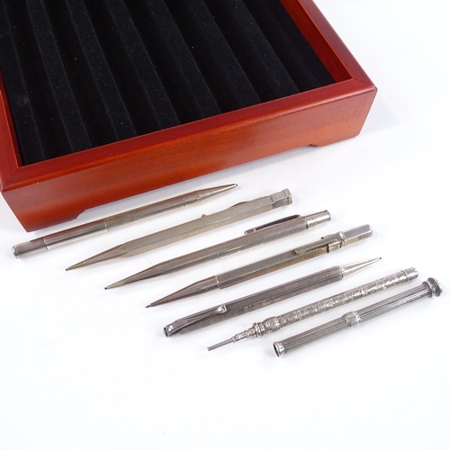 237 - 5 silver and 2 electroplate propelling pencils, by Yard -O-Led and Sampson Mordan, in glazed display... 