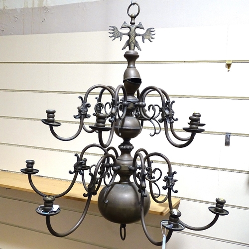 241 - A large Dutch style brass 12-branch chandelier, height 95cm